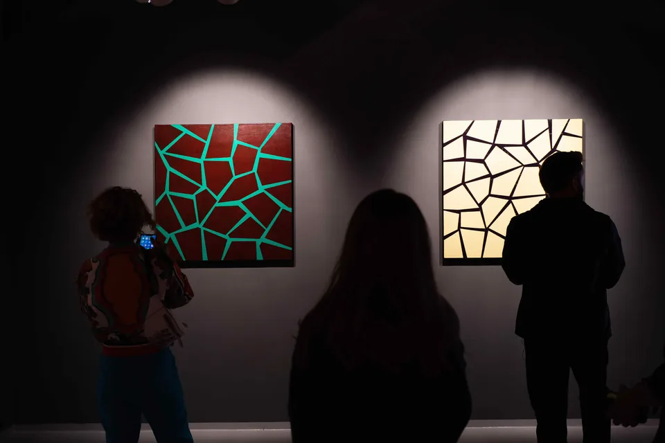 Visitors in the exhibition space at Cube.Moscow