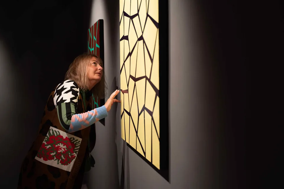 A visitor at the duende exhibition